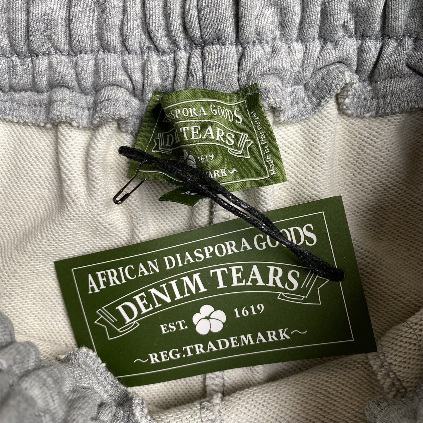 DENIM TEARS COTTON WREATH SWEATPANTS GREY
